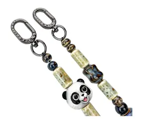 Nimmy Big Eye Cute Pets 2.0 černá / Přívěsek na tašku / Keramické korálky / 38,5 cm
